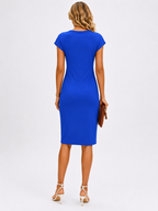 Woman wearing a blue dress on a white background