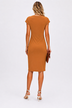 Woman wearing a brown dress on a white background