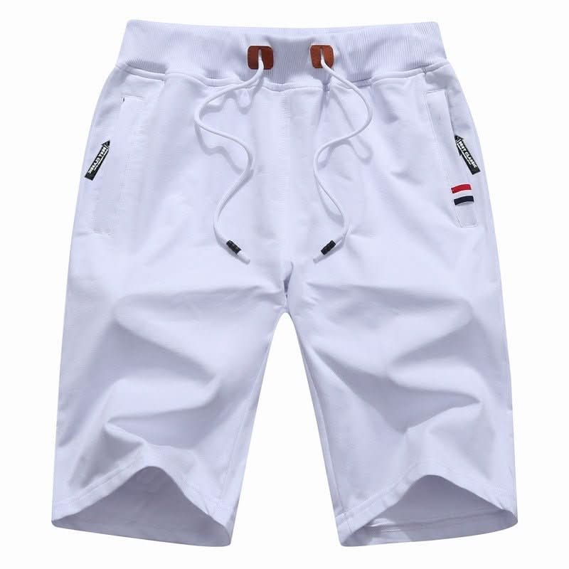 Men's white training shorts with a drawstring waist and zip pockets