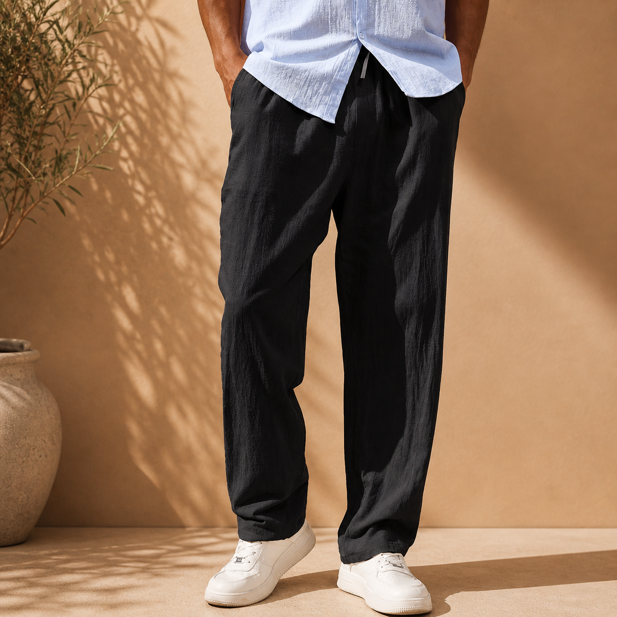 Men's white elastic waist straight leg trousers