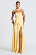 Women's yellow strapless maxi dress with a high front split