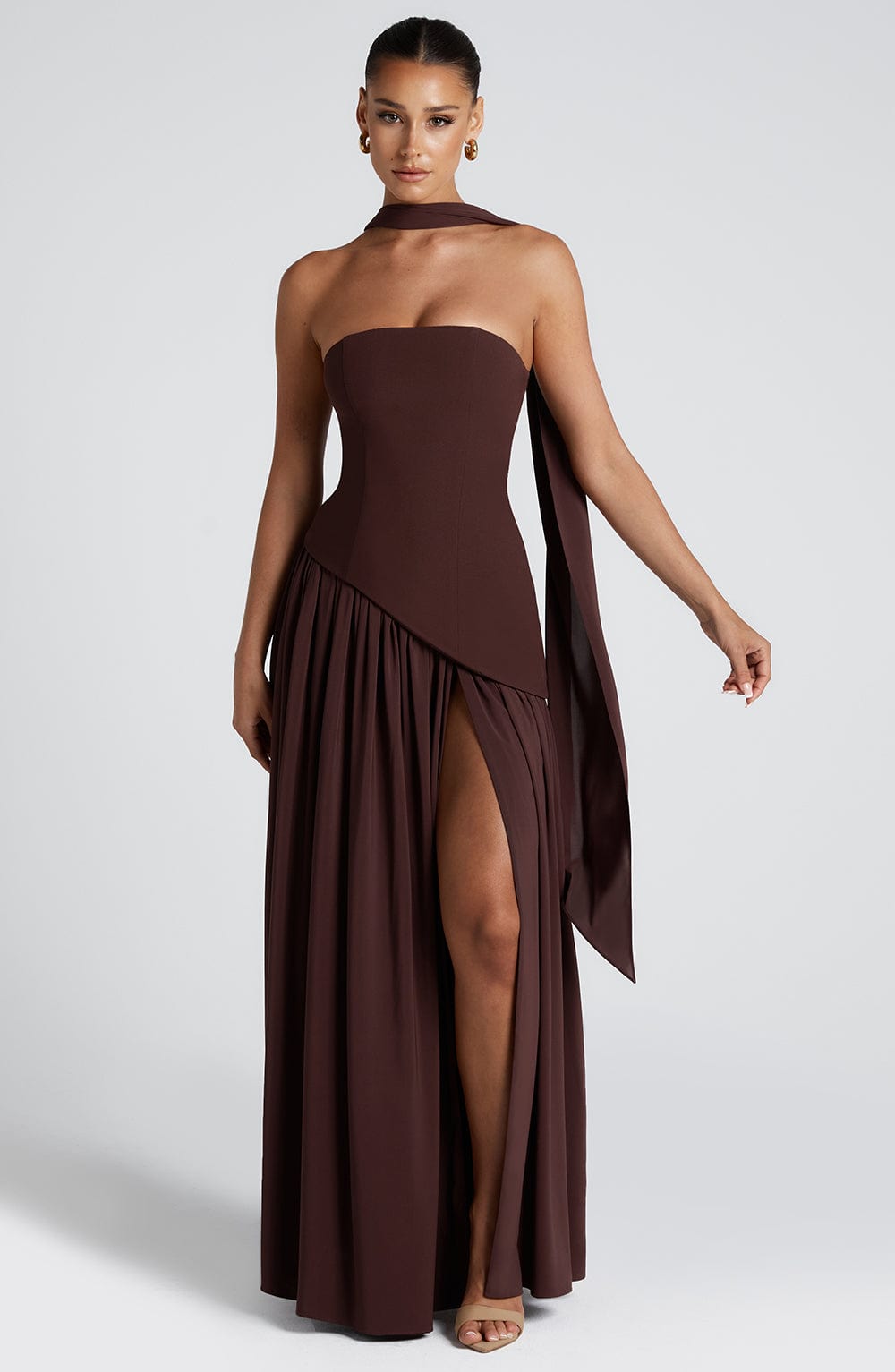 Women's brown strapless maxi dress with a high front split