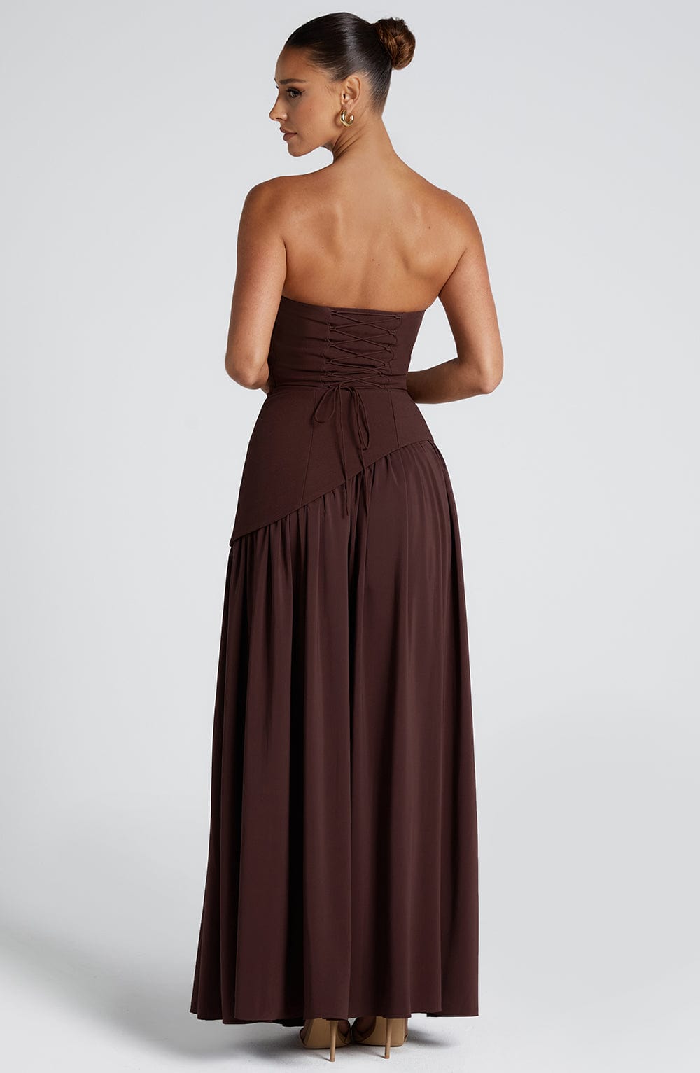 Women's brown strapless maxi dress with a high front split