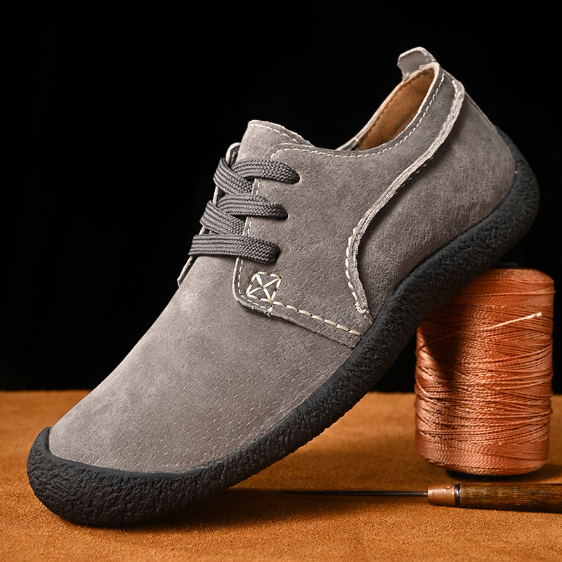 Men's khaki lace-up suede derby shoes with a rubber outsole