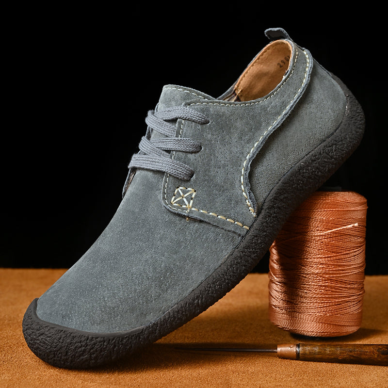 Men's khaki lace-up suede derby shoes with a rubber outsole