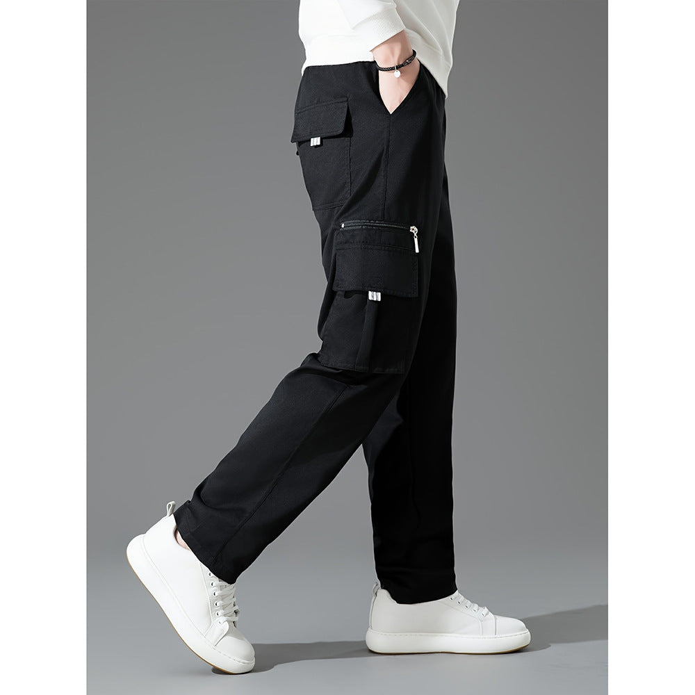 Men's grey loose fit cargo trousers with multiple pockets