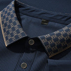 Men's navy blue contrast collar polo shirt with vertical texture