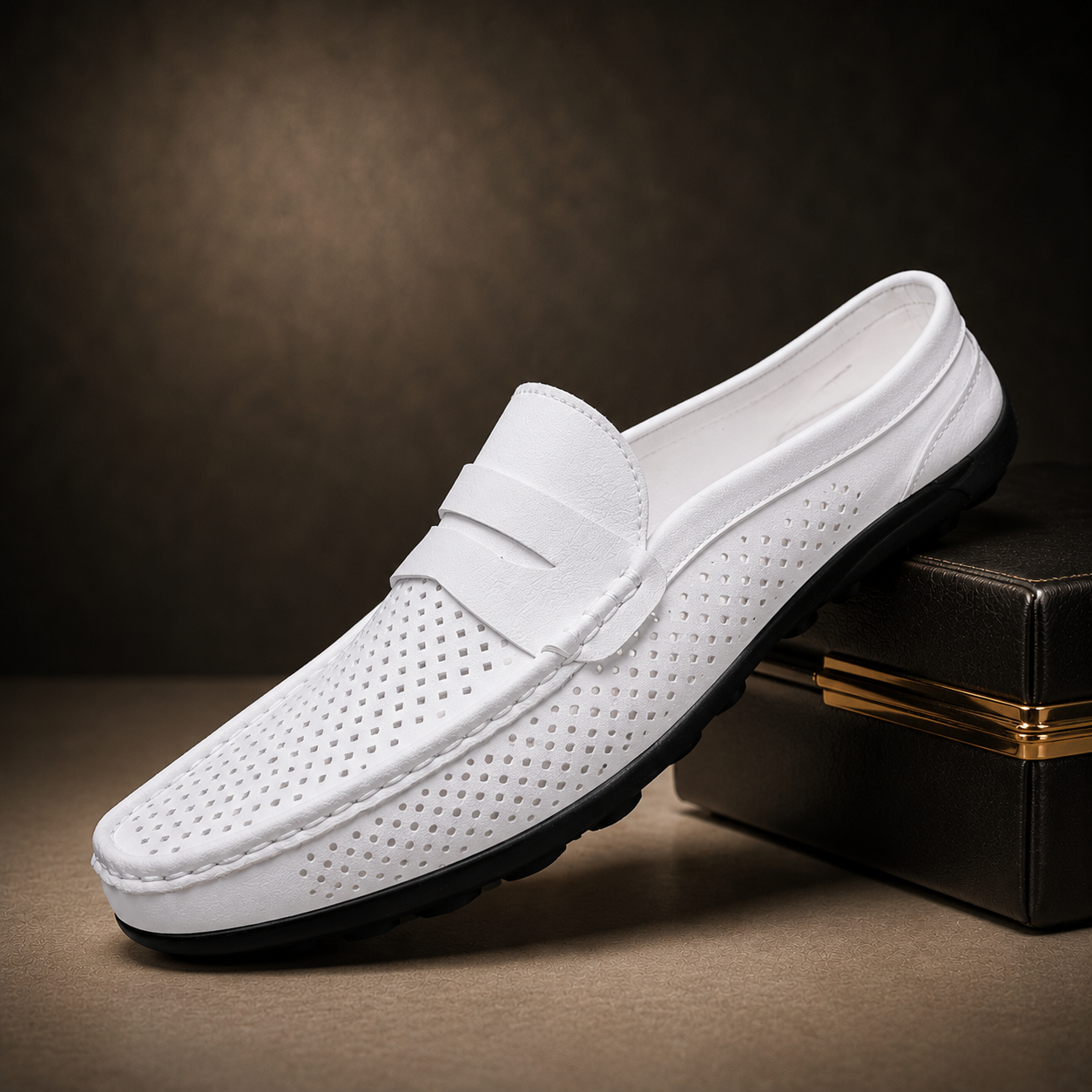 Men's black perforated slip-on loafers with a flexible sole