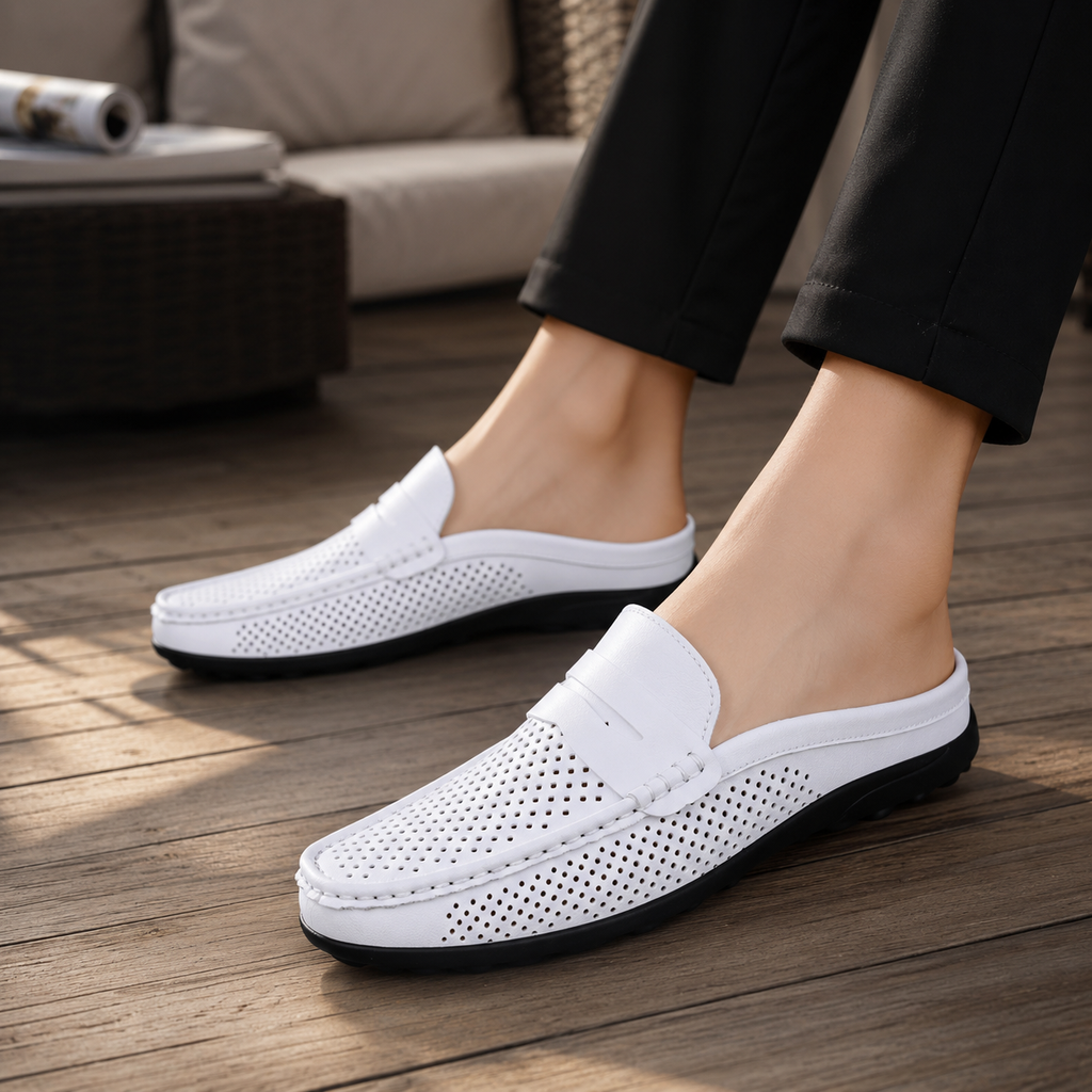 Men's black perforated slip-on loafers with a flexible sole