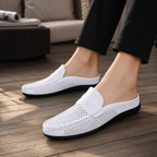 Men's black perforated slip-on loafers with a flexible sole