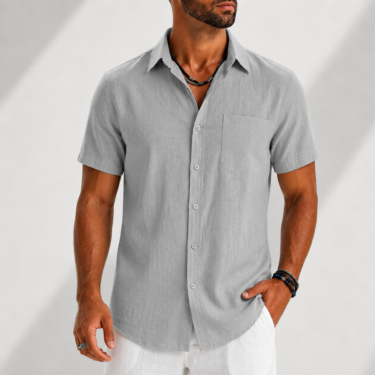 Men's white short sleeve shirt with a chest pocket