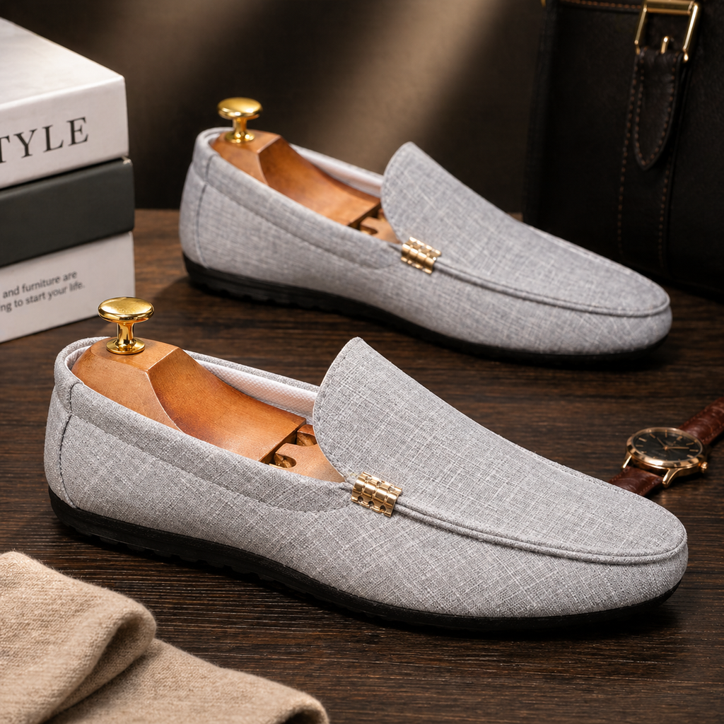 Men's grey slip-on canvas loafers with a flexible sole