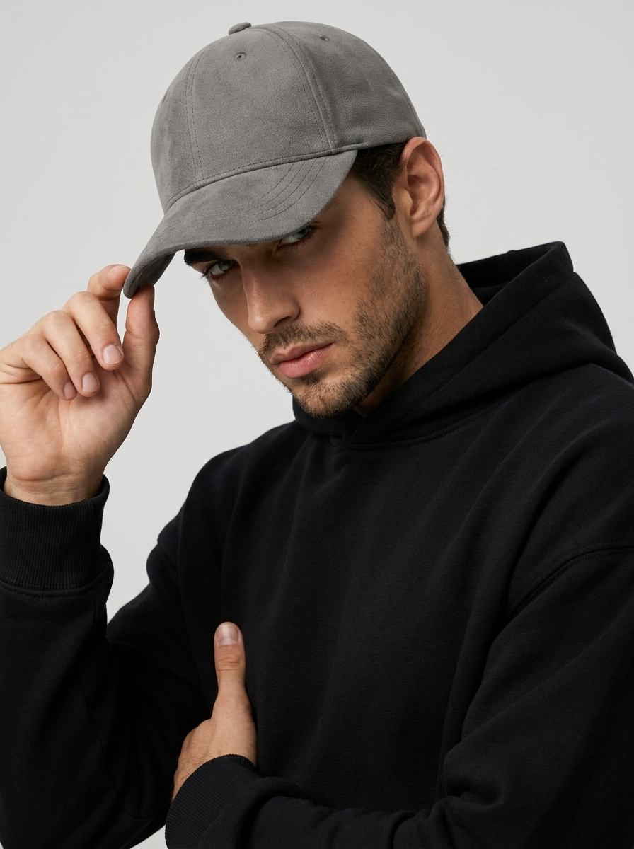 Faux leather baseball cap with an adjustable strap