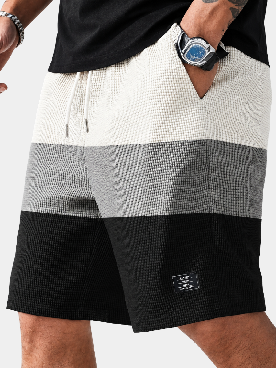 Men's white textured corduroy shorts with a drawstring waist