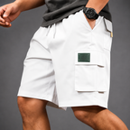 Men's white utility cargo shorts with multiple pockets