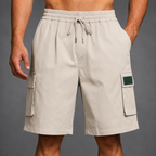 Men's beige utility cargo shorts with multiple pockets