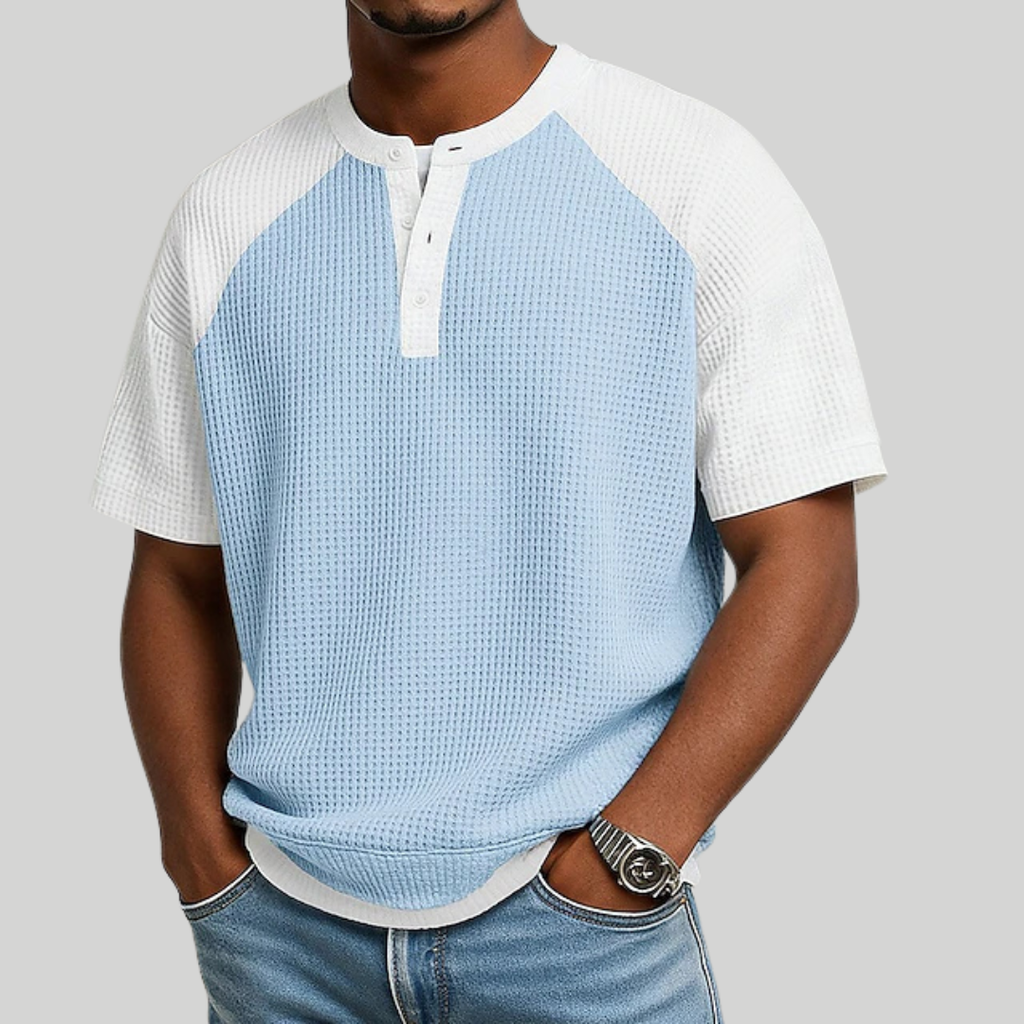 Men's light blue waffle knit polo shirt with a button placket